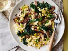 Try Food Network Magazine's Pasta with Corn and Kale for a fresh, seasonal summer recipe for Meatless Monday dinner.