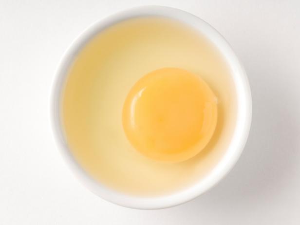raw egg in small bowl