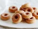 CINNAMON BAKED DOUGHNUTS Ina Garten Barefoot Contessa/Heard it on the Grapevine Food Network Baking Spray with Flour, Allpurpose Flour, Sugar, Baking Powder, Cinnamon, Nutmeg, Egg, Whole Milk, Unsalted Butter, Vanilla Extract