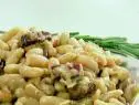 French flageolet beans with a sprig of rosemary.
