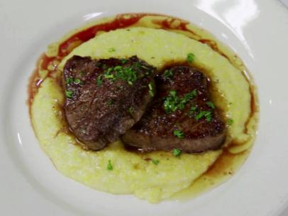 Seared beef tornadoes on a bed of mashed potatoes