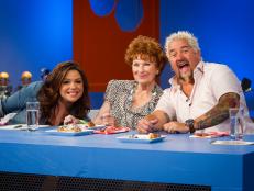 Hosts Rachael Ray and Guy Fieri pose with guest judge Guest Judge Marion Ross (middle) before tasting and scoring the finalist's brunch Cook-Off challenge dishes, as seen on Food Network's Rachel vs Guy Kids Cook-Off, Season 1.
