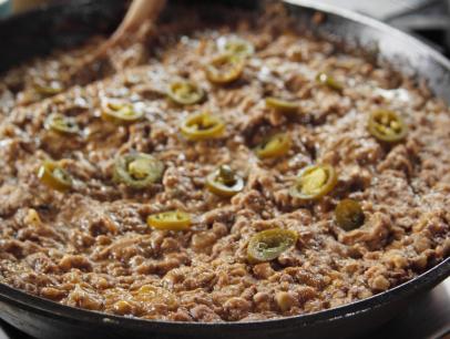 Cheesy Refried Beans in a pan, as seen on Food Network's The Pioneer Woman.
