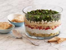 Spend more time in front of the game and less time in the kitchen by making this seven-layer dip the day before. It's a hearty option to serve with chips that's also vegetarian-friendly.
