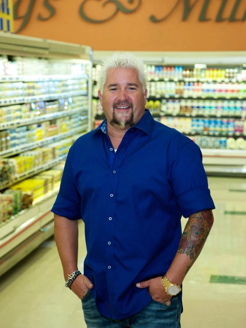 Host Guy Fieri poses during the taping of Food Network's Guy's Grocery Games, Season 1.