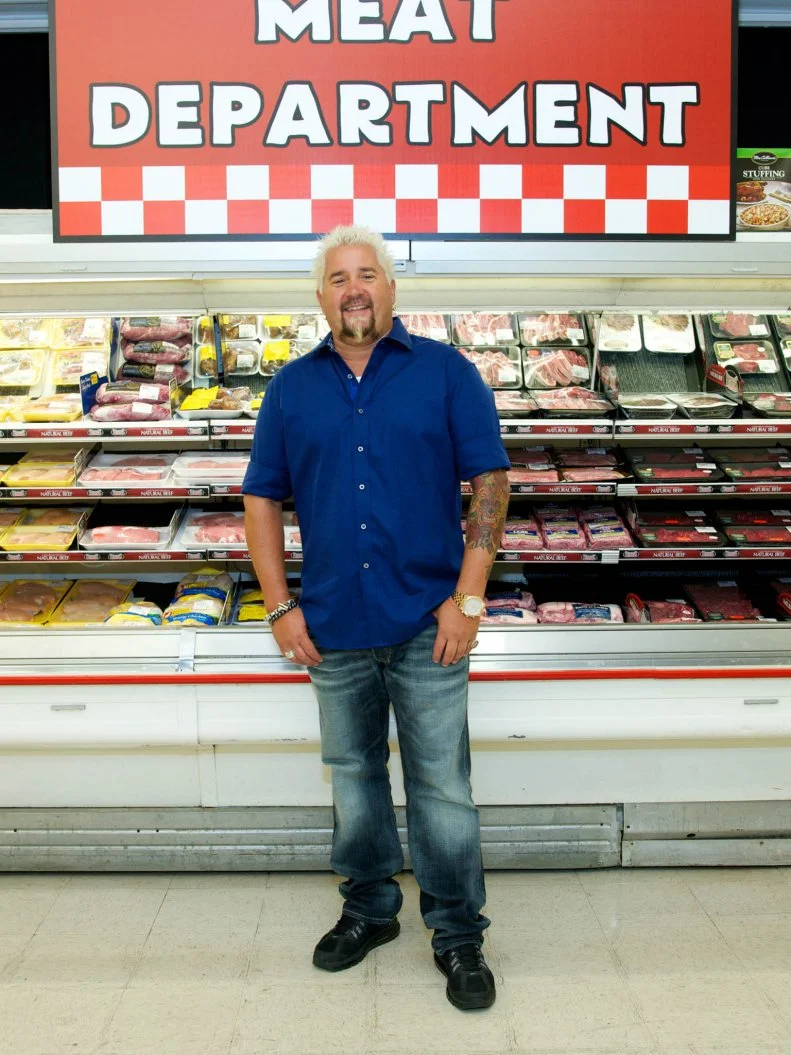 Host Guy Fieri poses during the taping of Food Network's Guy's Grocery Games, Season 1.