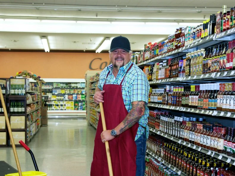 Host Guy Fieri poses during promo spot, as seen on Food Network's Guy's Grocery Games, Season 1.