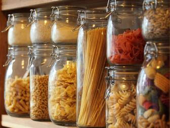 Dried pasta in jars on a shelf