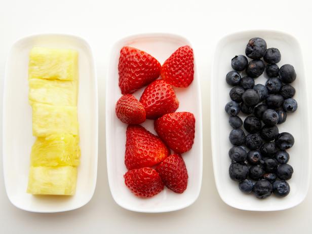 Variety of fresh fruit on plates