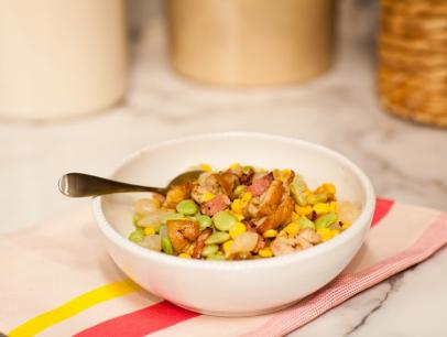 The dish recipe: Boneless, skinless chicken thighs saut©ed with lima beans, pearl onions, corn, and stewed in cream. Served garnished with crumbled crisp bacon. Creamy Chicken Succotash, as seen on Food Network's The Kitchen, Season 1.