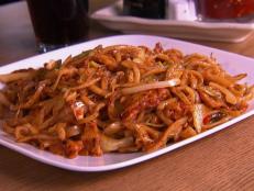 <p>Guy tried hand-pulling noodles, but it was no match for Frank Fong's mastery. At Frank's Noodle House, noodles are the star of the plate, as they're hand-pulled and handmade every day. Frank offers the noodles with vegetables, beef and even squid. But Guy likes his with Frank's marinated chicken.</p>