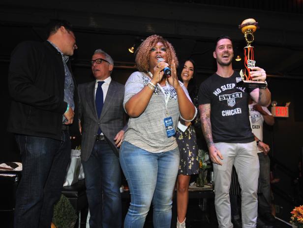 NEW YORK, NY - OCTOBER 17:  Sunny Anderson onstage with winners John Seymour and Randy Reppel of Sweat Chick accept award at Thrillist's Barbecue & The Blues presented by Creekstone Farms hosted by the cast of The Kitchen during the New York City Wine & Food Festival at Good Units on October 17, 2014 in New York City.  (Photo by Brad Barket/Getty Images for NYCWFF)