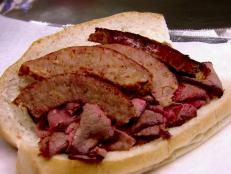 <p>On Diners, Drive-Ins and Dives, Guy and Duff stop by one of Baltimore's finest. From beef to turkey, Chaps Pit Beef infuses each bite with a hint of smoky charcoal goodness. Either way you cut it &mdash; rare, medium rare or well done &mdash; Chaps knows mouthwatering pit beef.</p>