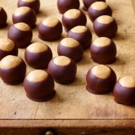 BUCKEYESFood Network KitchenFood NetworkConfectionersâ   Sugar, Peanut Butter, Unsalted Butter, Vanilla Extract, Kosher Salt, Semisweet orBittersweet Chocolate, Vegetable Shortening