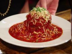 The Chicken Parmigiano is one of Maxwell’s most-popular items; it features chicken that is lightly breaded and sauteed, topped with mozzarella, then served with Mom Mom’s Gravy (marinara sauce) and a side of fettuccine. Guy loves the 10-ounce meatball you can add to any of your pastas.