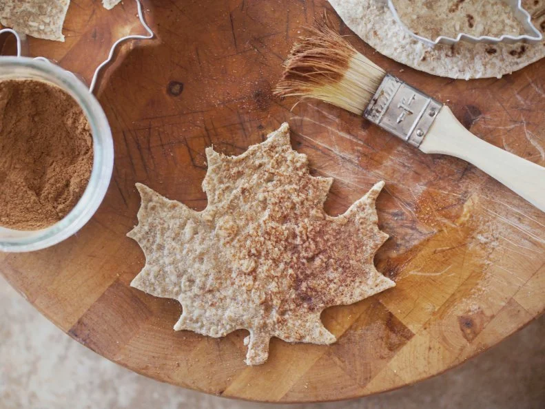 dip moistened brush into spices to color and flavor leaf chips
