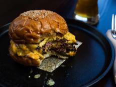 When he needs a smoky bite, Johnny Iuzzini heads to South Carolina, not for ribs, but for Husk&rsquo;s cornbread made with bacon bits. This spot and its Tennessee outpost also offer meaty goodness in the form of the Husk Cheeseburger: chuck, flank steak and bacon patties smothered with American cheese.