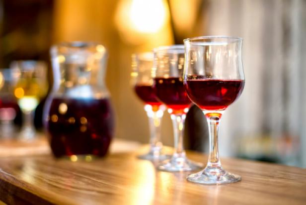 Wine glasses with carafe and champagne at dinner cocktail party