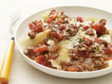 In this case, "deconstructed" is really just a trendy way of saying easy! Instead of taking the time to layer the pasta, sauce, and several kinds of cheeses, I toss everything together to make a lasagna bowl that satisfies, with all of the same, indulgent components but far fewer calories and effort. Fresh marjoram has a minty, oregano-like flavor that is a nice change of pace from basil or dried Italian herbs-but really, any kind of fresh herb is delicious in tomato sauce, so use what's handy.