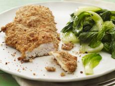 Here's my healthier version of fried chicken tenders. The homemade honey mustard helps the whole wheat bread crumbs stick to the chicken. Make double the amount of the honey mustard if you want some dipping sauce on the side.