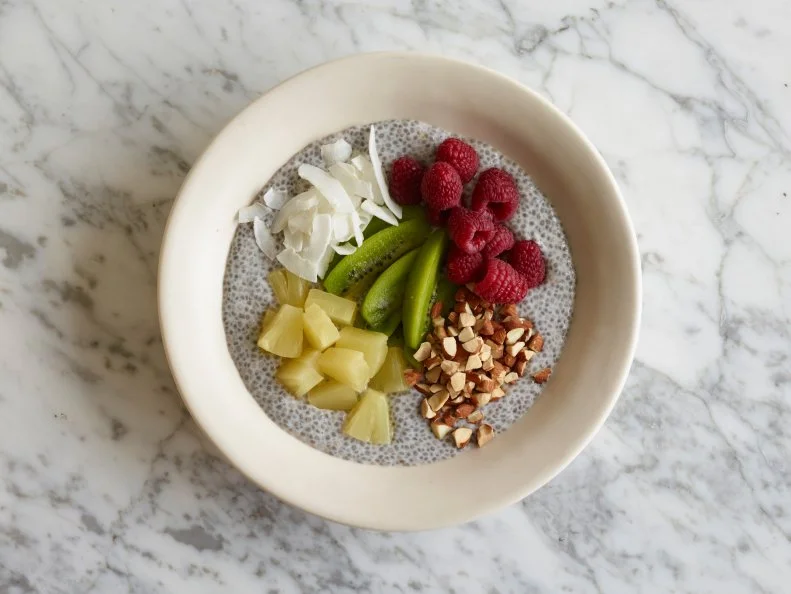 CC COCONUTCHIA PUDDING BREAKFAST BOWL Cooking Channel Light Coconut Milk, Chia Seeds, Maple Syrup, Pineapple Chunks, Kiwi, Raspberries, Roasted Almonds, Unsweetened Coconut Flakes