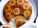 PINEAPPLE UPSIDEDOWNCAKE, Damaris Phillips, Southern at Heart/Card Gamewith Grampy, Food Network, Unsalted Butter, Dark Brown Sugar, Sliced Pineapples,Crushed Pineapple, AllpurposeFlour, Baking Powder, Milk, Vanilla Extract, PineappleJuice, Sugar, Coconut Oil, Egg
