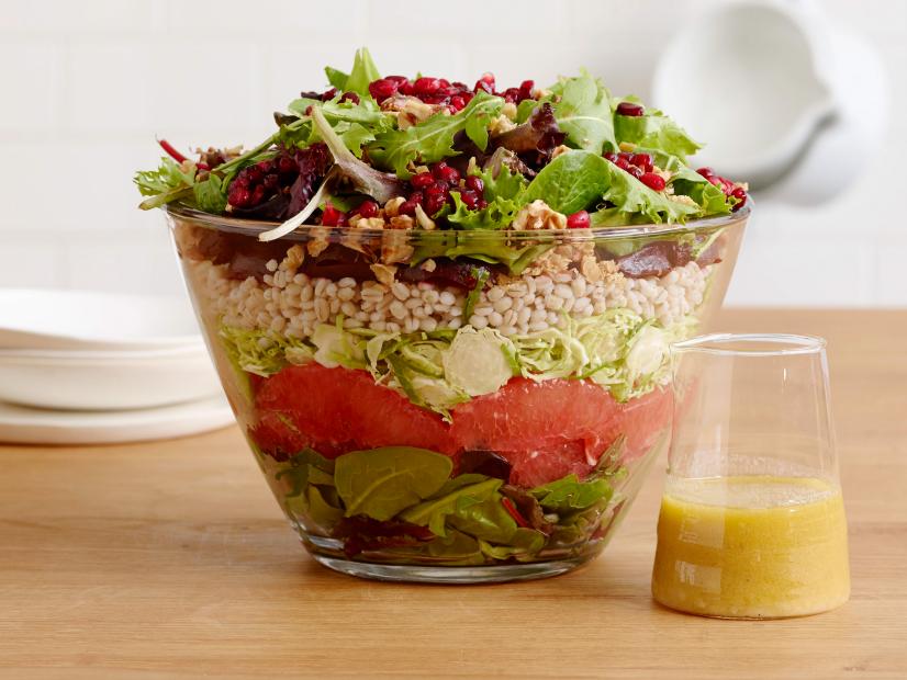 WINTER LAYERED SALAD WITH BEETS AND BRUSSELS SPROUTS
Food Network Kitchen
Walnuts, Barley, Pink Grapefruit, Red Wine Vinegar, Shallot, Honey, Dijon Mustard, Olive Oil,
Mesclun Mixed Greens, Brussels Sprouts, Beets, Pomegranate Seeds