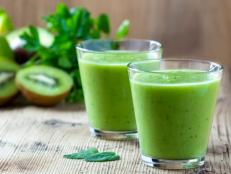 Healthy green Smoothie on wooden table