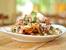 Chefs Mary Sue Milliken and Susan Feniger serve straightforward Mexican food at Border Grill, where dishes range from green corn tamales to Yucatan pork. Try the Skillet Nachos, which feature scratch-made tortilla chips and cheese sauce, organic black beans and tender morsels of carne asada.