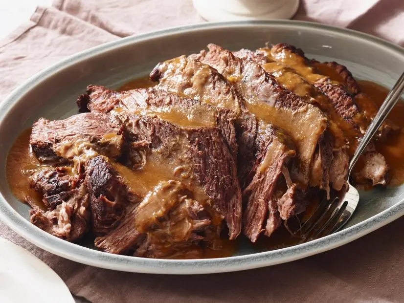 FNK SLOW COOKER POT ROAST
Food Network
Beef Chuck Roast, Olive Oil, Garlic, Yellow Onions, Tomato Paste, Beef Broth, Red Wine,
Worcestershire Sauce, Carrots, Parsley, Thyme, Bay Leaves, Celery