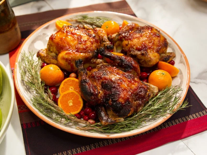 Food Beauty of cranberry glazed cornish game hens, during a holiday theme episode, as seen on Food Networkâ  s The Kitchen, Season 4.