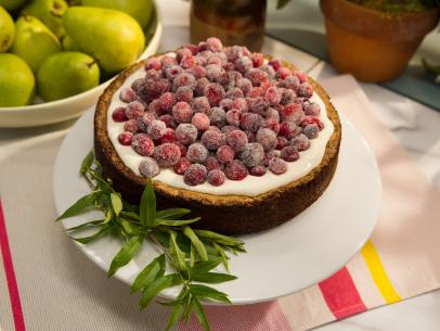 Food Beauty of a winter fruit topped holiday cake, during a holiday theme episode, as seen on Food Network’s The Kitchen, Season 4.