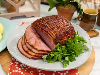 Food beauty of apricot jelly glazed ham from a Holiday theme episode, as seen on Food Network’s The Kitchen, Season 4.