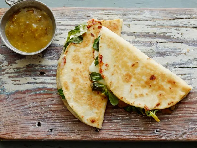 PURSLANE QUESADILLASFood Network KitchenPurslane, Flour Tortillas, Mozzarella or Oaxacan Cheese, Salsa Verde, Unsalted Butter