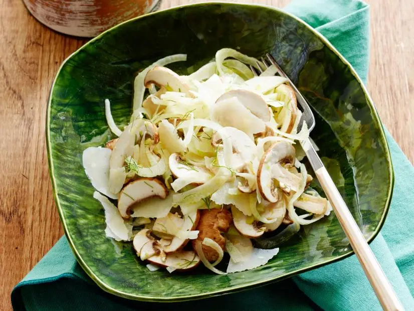 SHAVED FENNEL, MUSHROOM AND PARMESAN SALADFood Network KitchenLemon, Olive Oil, Cremini Mushrooms, Fennel Bulbs, Parmesan