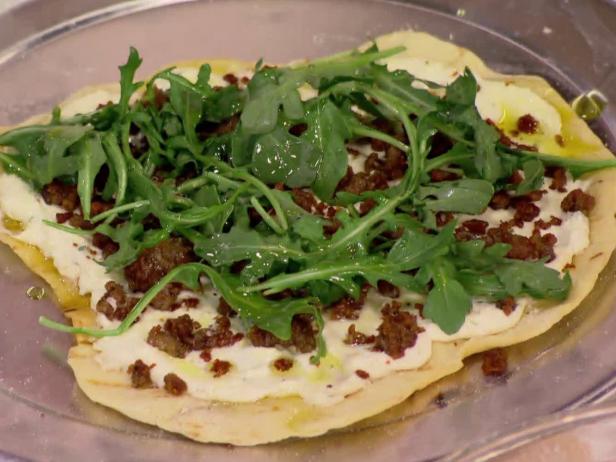 Grilled Pizzetta with Ricotta, Sausage, Arugula and Chili Oil image