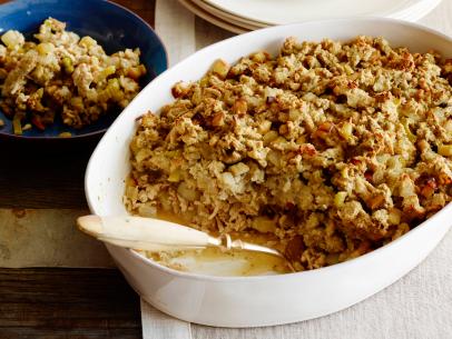 TURKEY AND STUFFING CASSEROLERachael RayRachael Rayâ  s Week In A Day/Layer It Up!Cooking ChannelOlive Oil, Butter, Ground Turkey, Worcestershire Sauce, Celery, Carrot, Onion, Potato, Thyme,Flour, Chicken or Turkey Stock, Frozen Peas, Apples, Bay Leaf, Poultry Seasoning, SeasonedStuffing Mix