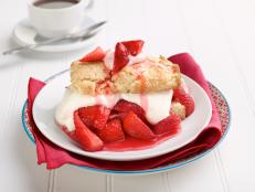 Make a from-scratch Strawberry Shortcake recipe from Food Network with fresh whipped cream, juicy strawberries and homemade shortcake.