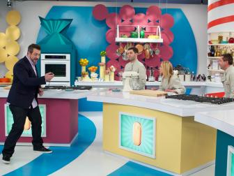 Host Joey Fatone of Cooking Channel's Rewrapped, Season 1, with competitors Johnny Manganiotis (L), Tanya Salagiannis, and Francesco Guerrieri, during the competition of Round 1, the recreation of the classic Pepperidge Farm Mint Milano Cookies, as seen on Food Network's Rewrapped, Season 1.