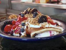 At this diner, an English husband and wife are livin' the American dream and serving up breakfast all day. Guy claims that the pancake roll with yogurt and berries is "righteous." Want a burger? Try the chorizo burger with fiery hot habanero salsa, avocado and flavor that is "out of bounds."
