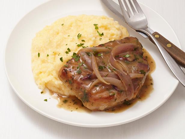Smothered Pork Chops and Grits image