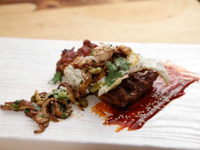 Chef Bobby Flay's Kimchee Meatloaf. Each chef prepared his own bold version of a classic meatloaf  knowing safe won't cut it with the judges, and they are both out to win,  as seen on Food Network’s Beat Bobby Flay, Season 1.