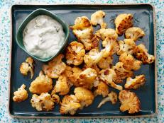 Food Network Kitchen's Healthy Buffalo Cauliflower with Blue Cheese Sauce for Healthy Vegetable Side Dishes as seen on Food Network