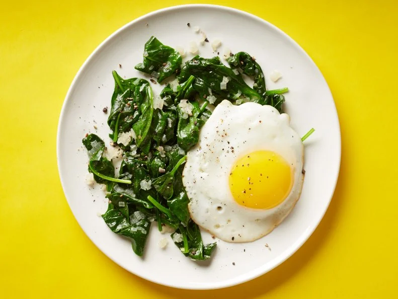 Food Network Kitchen's Fried Egg with Baby Spinach and Shallot for Superfood Breakfast as seen on Food Network