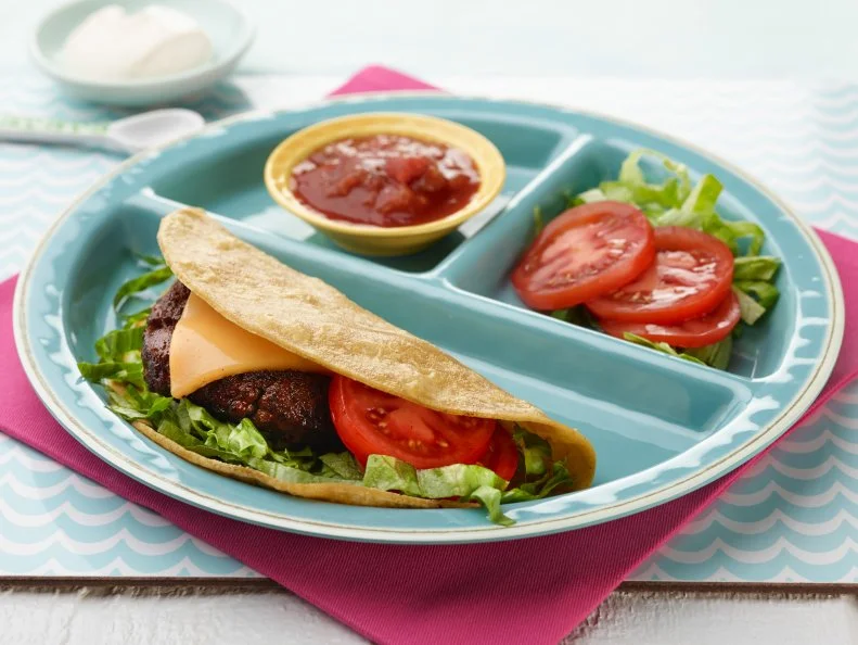 Chef Name: Food Network Kitchen

Full Recipe Name: Kids Can Make: Taco Cheeseburger

Talent Recipe: 

FNK Recipe: Food Network Kitchenâ  s Kids Can Make: Taco Cheeseburger, as seen on Foodnetwork.com

Project: Foodnetwork.com, SUMMER/APPETIZERS/PASTA

Show Name: 

Food Network / Cooking Channel: Food Network