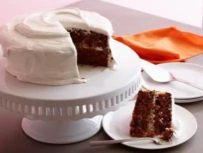 CARROT CAKE WITH MARSHMALLOW FLUFF CREAM CHEESE FROSTING
Bobby Flay
Throwdown With Bobby Flay/Carrot Cake
Food Network
Unsalted Butter, Crushed Pineapple, Eggs, Canola Oil, Vanilla Extract, Carrots, Fresh Ginger,
Allpurpose
Flour, Organic Cane Sugar, Muscavado Sugar, Baking Soda, Cinnamon, Ground
Ginger, Fresh Nutmeg, Salt, Crystallized Ginger, Toasted Pecans, Light Corn Syrup, Granulated
Sugar, Vanilla Bean, Cream of Tartar, Cream Cheese, Powdered Sugar, Fluff,CARROT CAKE WITH MARSHMALLOW FLUFF CREAM CHEESE FROSTING
Bobby Flay
Throwdown With Bobby Flay/Carrot Cake
Food Network
Unsalted Butter, Crushed Pineapple, Eggs, Canola Oil, Vanilla Extract, Carrots, Fresh Ginger,
Allpurpose
Flour, Organic Cane Sugar, Muscavado Sugar, Baking Soda, Cinnamon, Ground
Ginger, Fresh Nutmeg, Salt, Crystallized Ginger, Toasted Pecans, Light Corn Syrup, Granulated
Sugar, Vanilla Bean, Cream of Tartar, Cream Cheese, Powdered Sugar, Fluff