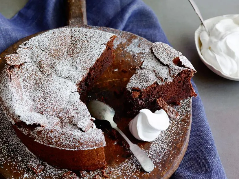 CRACKED CHOCOLATE EARTH WITH WHIPPED CREAM (FLOURLESS CHOCOLATECAKE)Tyler FlorenceFood NetworkBittersweet Chocolate, Unsalted Butter, Eggs, Granulated Sugar, Heavy Cream, Confectionersâ  Sugar