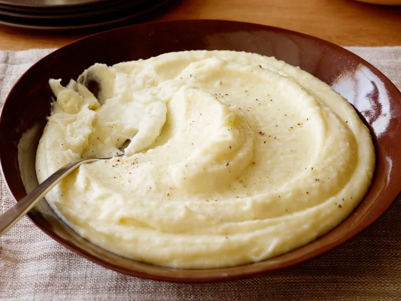 GARLIC YUKON GOLD MASHED POTATOES
Anne Burrell
Secrets Of A Restaurant Chef/The Secret To Roasted Chicken
Food Network
Yukon Gold Potatoes, Garlic, Kosher Salt, Heavy Cream, Butter