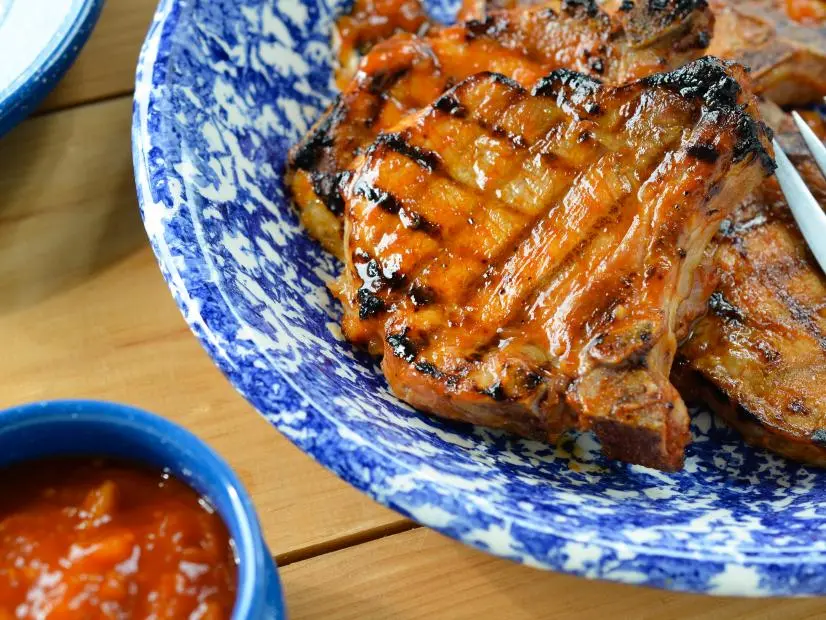 Virginia Willis' Grilled Pork Chops with Peach-Dijon BBQ Sauce for FoodNetwork.com
