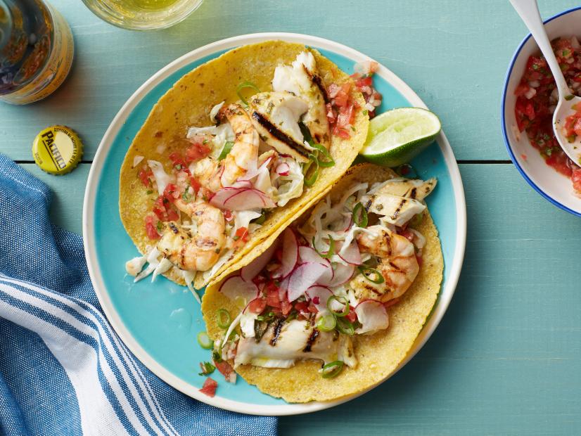 Food Network Kitchen's Tilapia and Shrimp Tacos with Cabbage Slaw